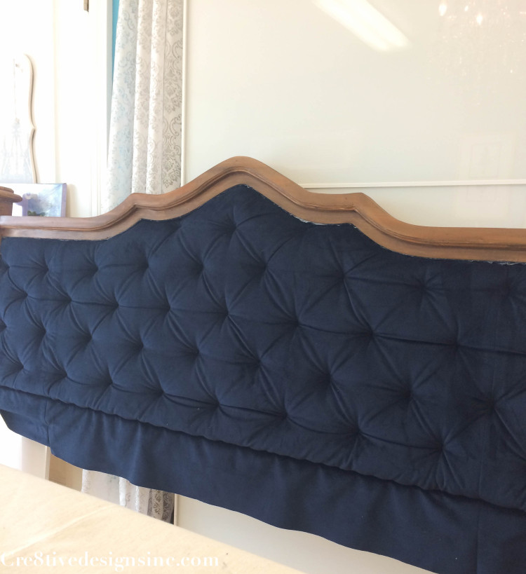 Blue tufted headboard