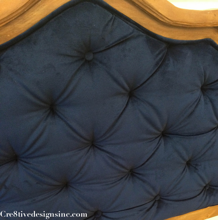 Blue tufted headboard