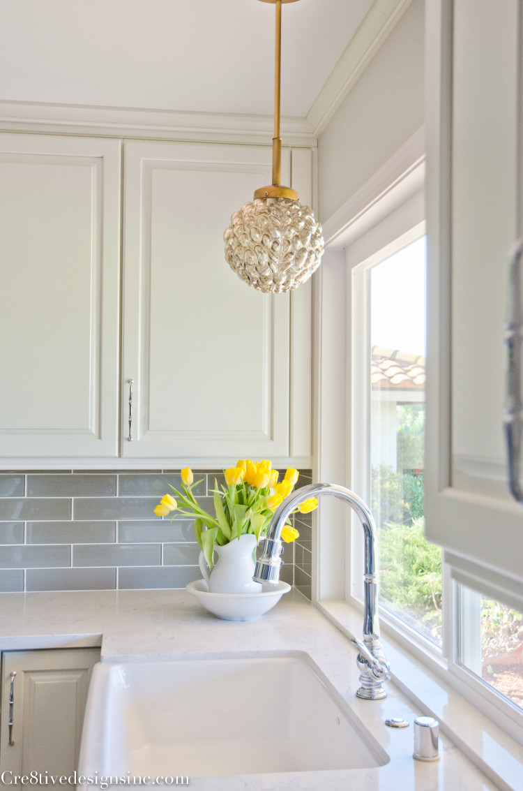 Pendant light over farmhouse sink